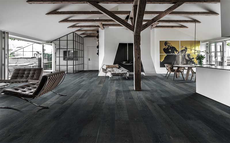 The use of dark wood for the floor.